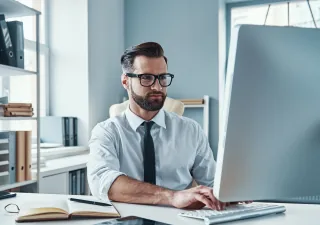 handsome young businessman working desk
